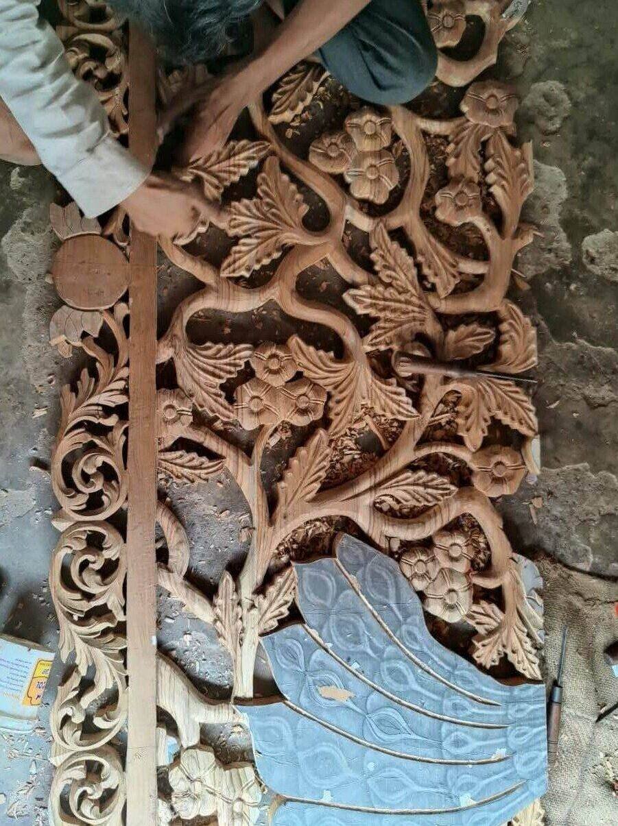 Handcrafted furniture carving by skilled artisans